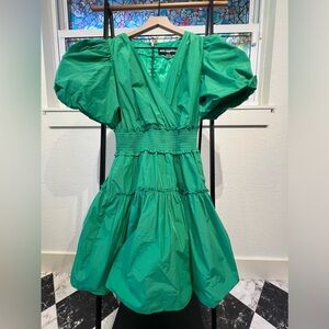 Pretty occasion dress by Karl Lagerfeld. Zip closure, v neck, short puff sleeves